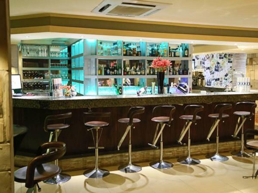 Roca Golf Hotel Бужумбура Екстериор снимка